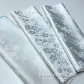 Poliéster Spandex tejido blanco floral jacquard tela satinada